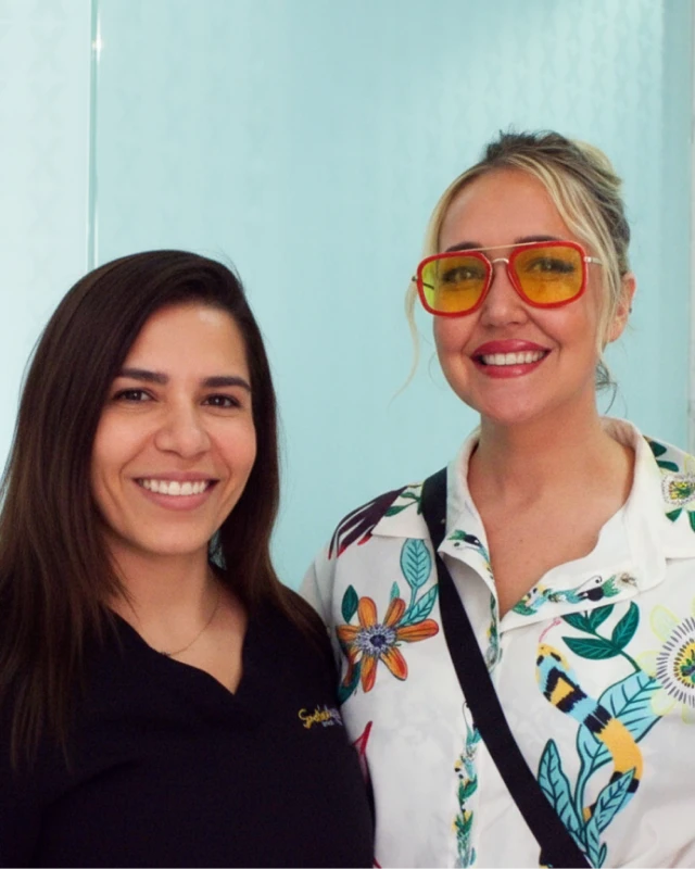 Dr. Martha Tziu performing cosmetic dental restoration