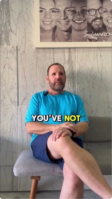 Patient video testimonial about a smile makeover in a dental clinic.