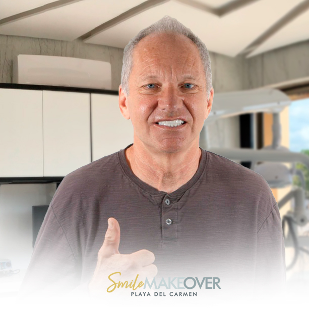  A man in a gray shirt with  snap on dentures at smile makeover